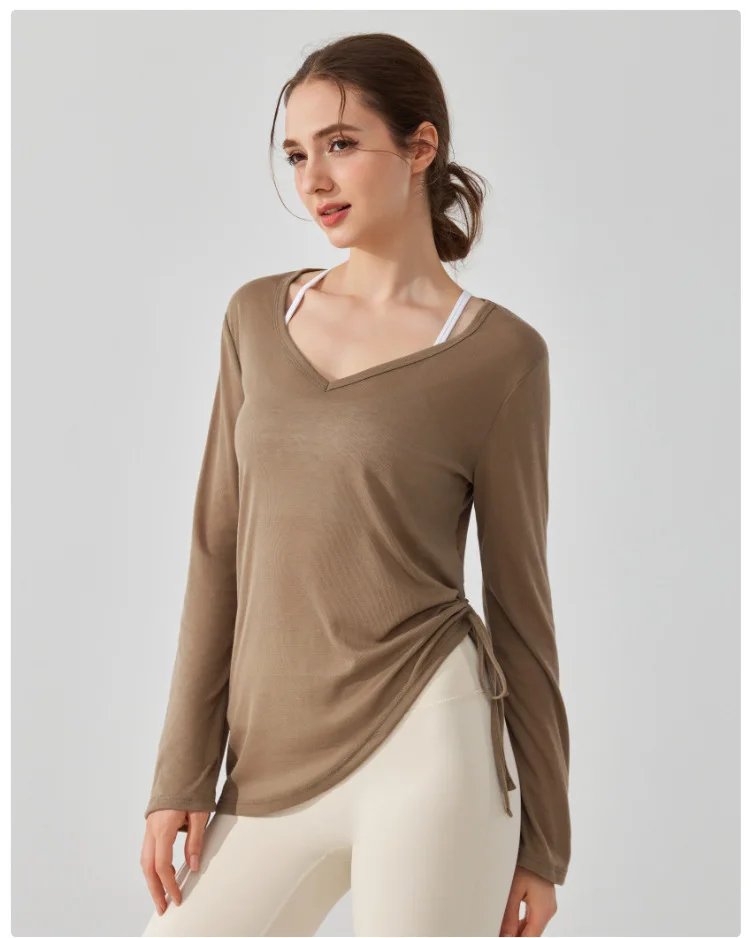 Sporttop mit Kordelzug und Falten für Damen, locker geschnitten, langärmelig, hüftbedeckend, unregelmäßiger Schnitt, geeignet für Pilates, Fitness und Yoga. – Detail 5