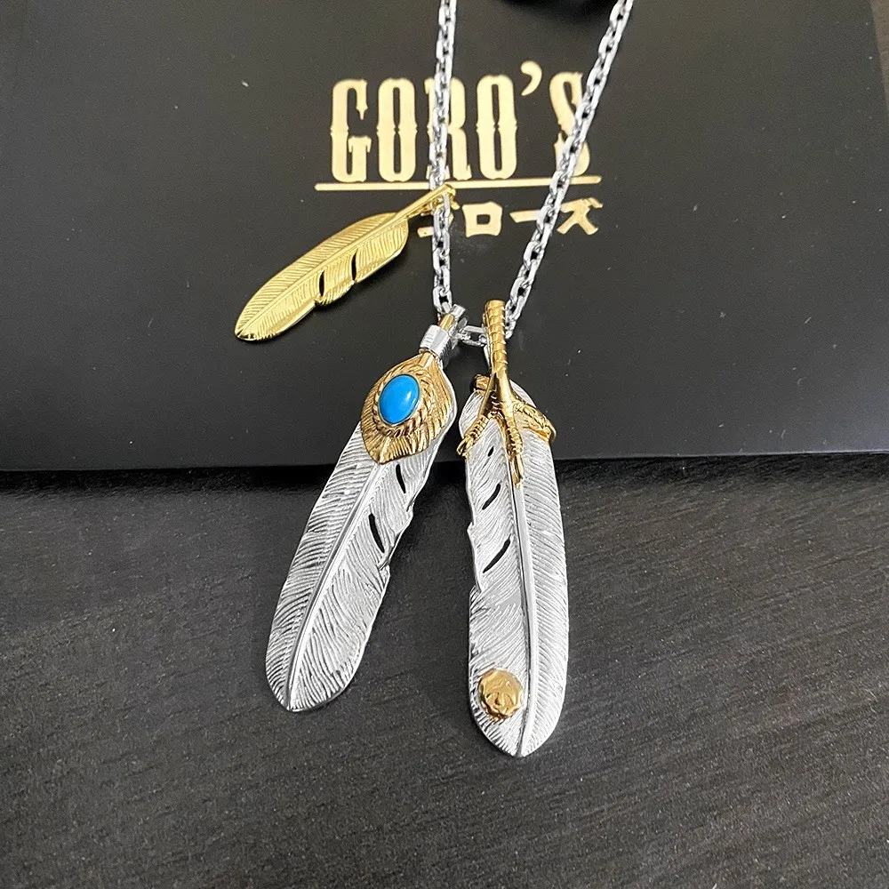 

Takahashi Goro's Goro Gold-Plated Eagle Claw Necklace with Turquoise Feather Inlay and Gold-Plated Small Feather Accents