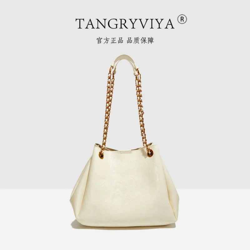 高級レザー製の女性用ショルダーバッグ、パリのカジュアルでエレガントなデイリールックを演出します。 ​