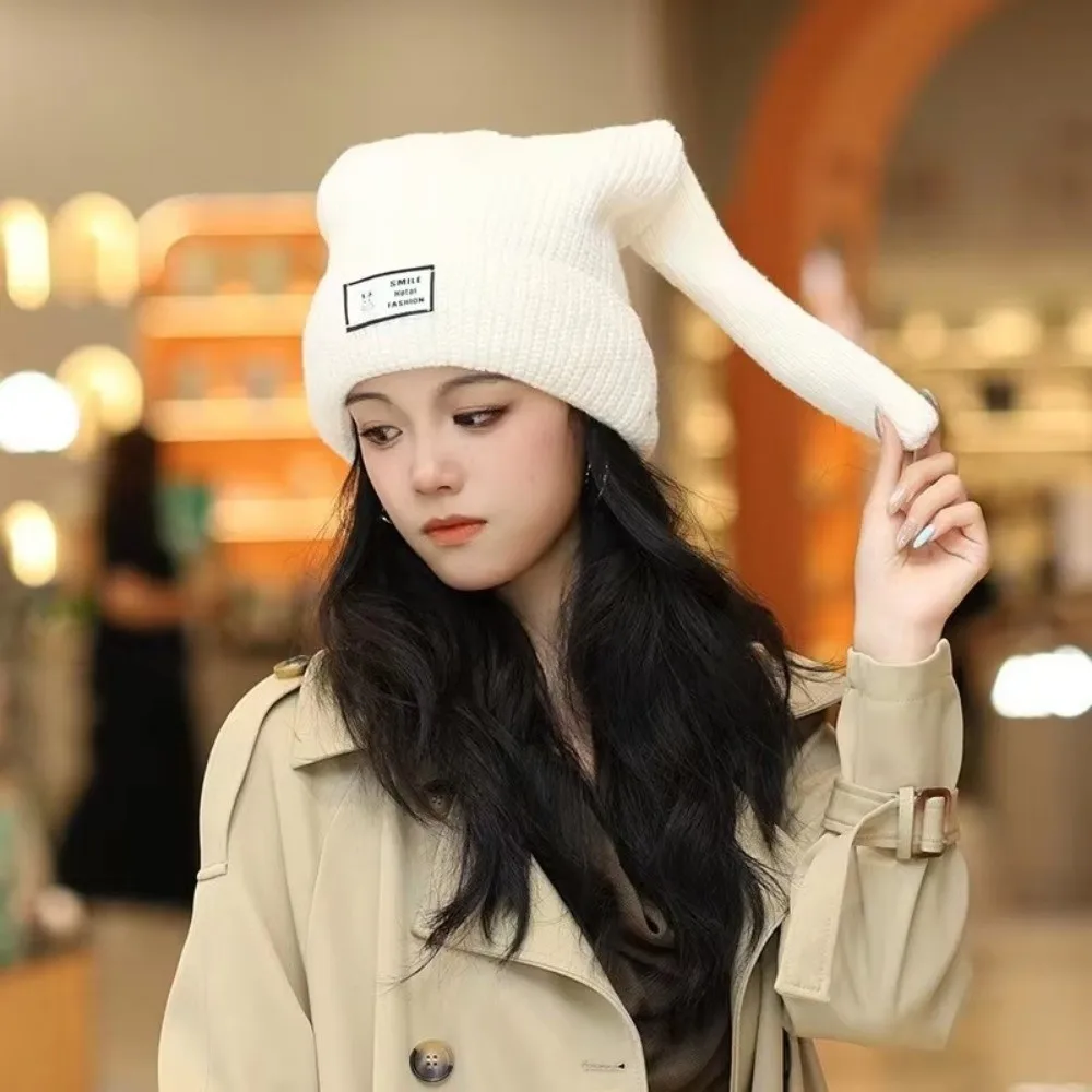 

Модная осенне-зимняя вязаная шерстяная шапка, теплая шапка с кроличьими ушками, нишевая дизайнерская защитная шапка для ушей для мужчин и женщин