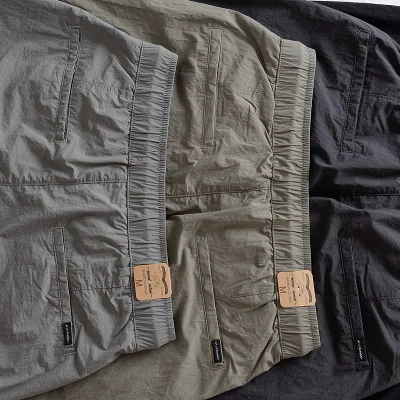 Nuovi pantaloni da lavoro in seta di ghiaccio da uomo 2024 larghi sottili Qui Dry pantaloni lunghi sportivi casual giapponese Sle elastico vestibilità ampia giovanile