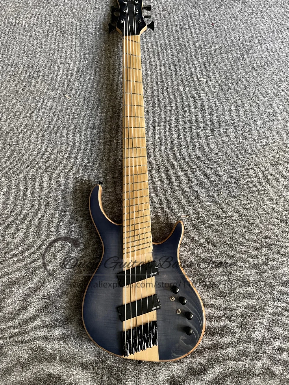 6 string transpre black bass, flamed maple top, fixed bridge, maple neck through  ASH wood body, active battery