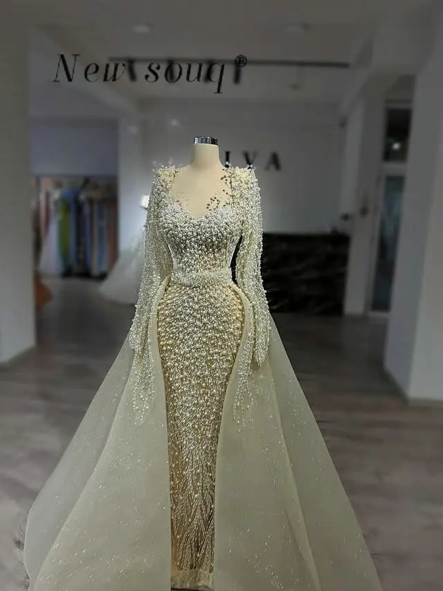 Eleganckie beżowe suknie wieczorowe typu syrena z długimi rękawami, zdobione perłami, z odpinanym trenem, na formalne przyjęcia weselne, szyte na miarę, kolekcja 2026.