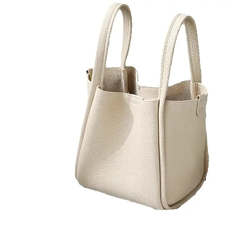

Fashionable new vegetable basket designer style cowhide large capacity niche commuting handbag bucket bag