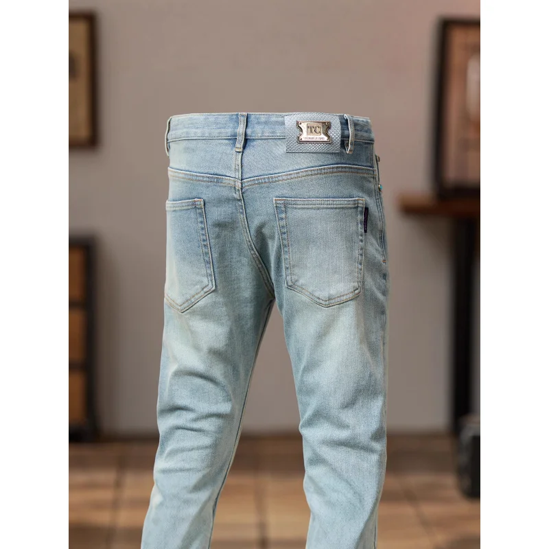 2025 جديد ريترو الضوء الأزرق الجينز الرجال العلامة التجارية العصرية تمتد سليم صالح أقدام صغيرة بسيطة عادية النسخة الكورية السراويل