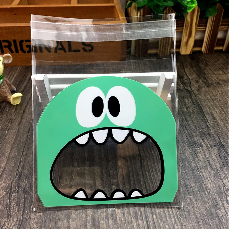 50 stücke 7 cm/10 cm Nette Kleine Monster Scharfen Zähnen Geschenk-backen-plätzchen Süßigkeiten Kunststoff Geschenk-verpackung Taschen OPP