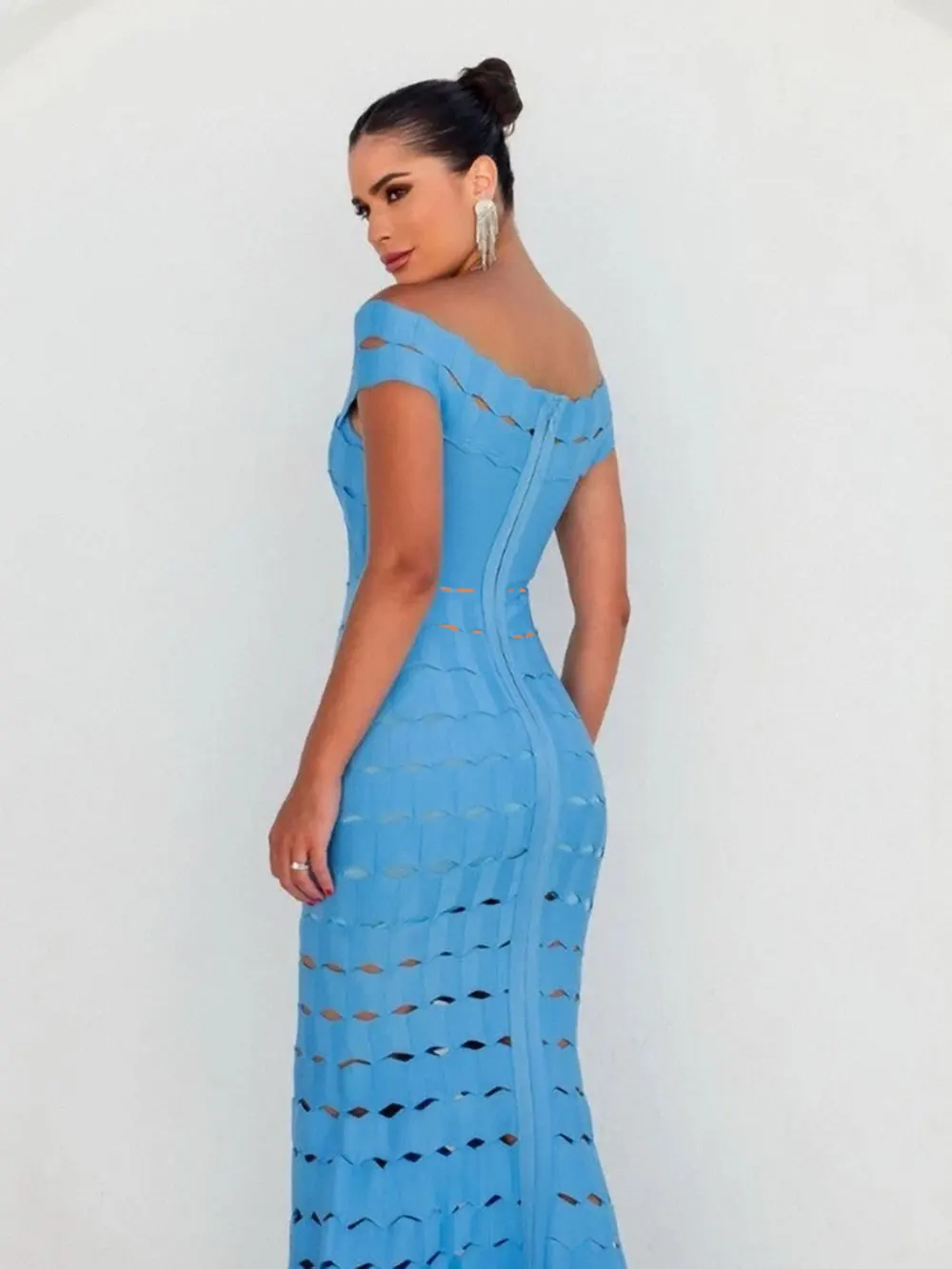 2025 primavera Sexy mujer diseño de corte hueco vendaje vestido con un cuello hombros ceñido al cuerpo vestido Midi sin espalda Vestidos de fiesta para discoteca