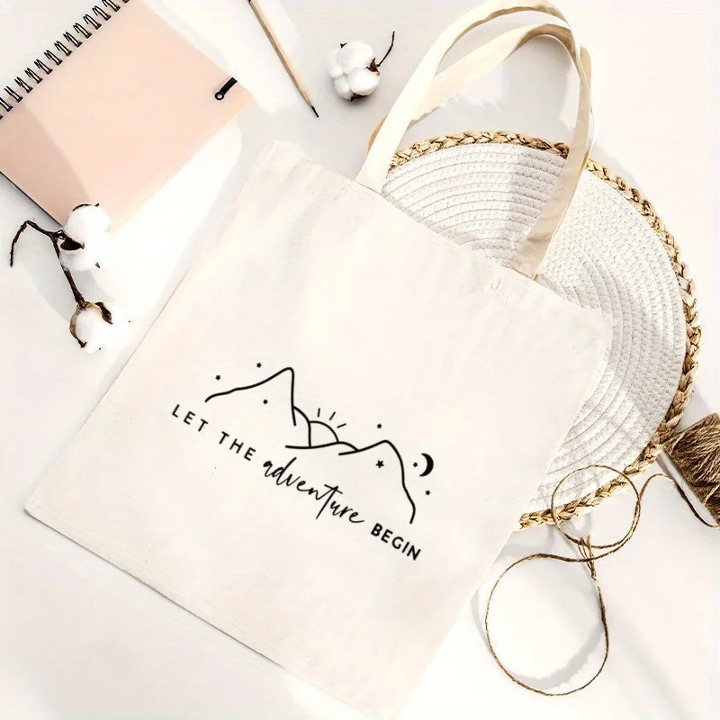 A Mountain and Star Print canvas tote bag, suitable for daily use, shopping, school, and travel