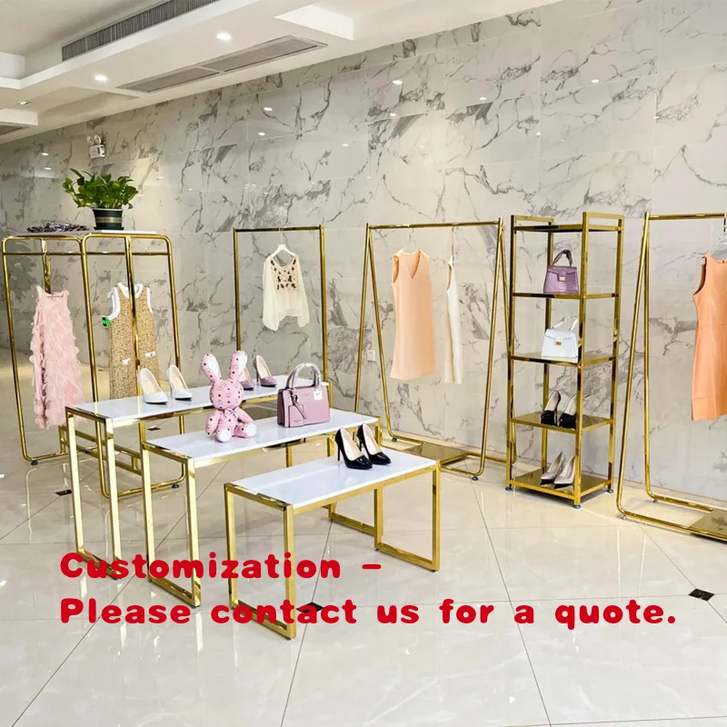 

custom.Boutique Gold Clothing Wall Rack Nesting Table Clothes Shelving Garment Display Rack Clothing Store Furniture