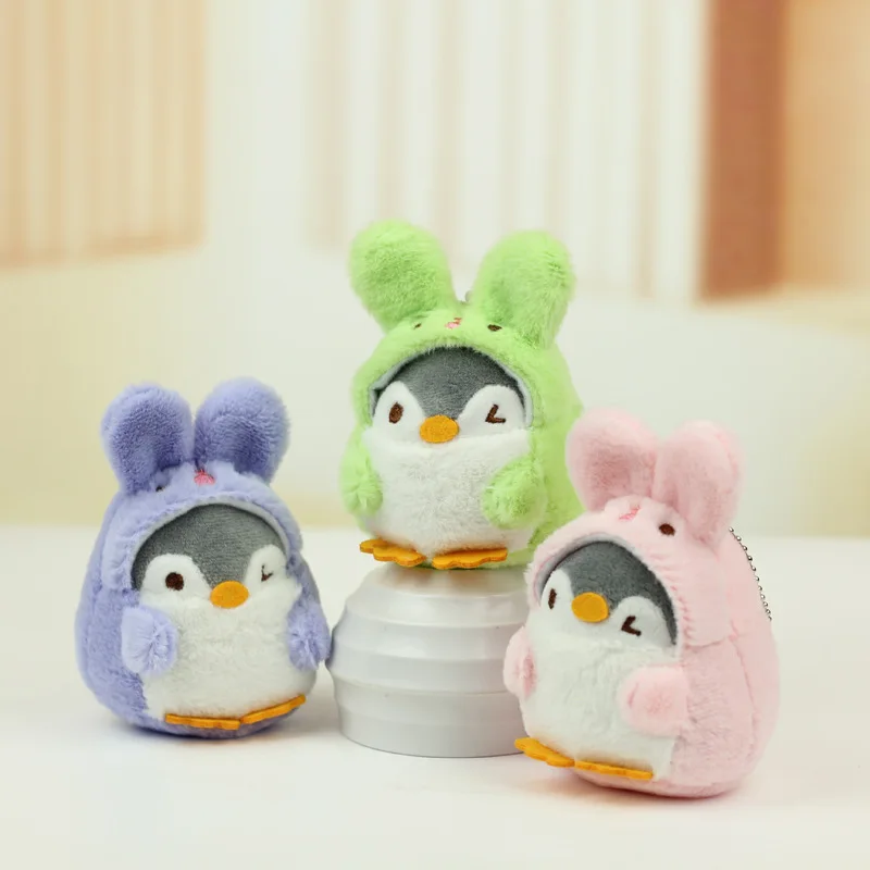 دمية قطيفة على شكل بطريق أو أرنب لطيف، قلادة مفاتيح أو زينة للحقائب