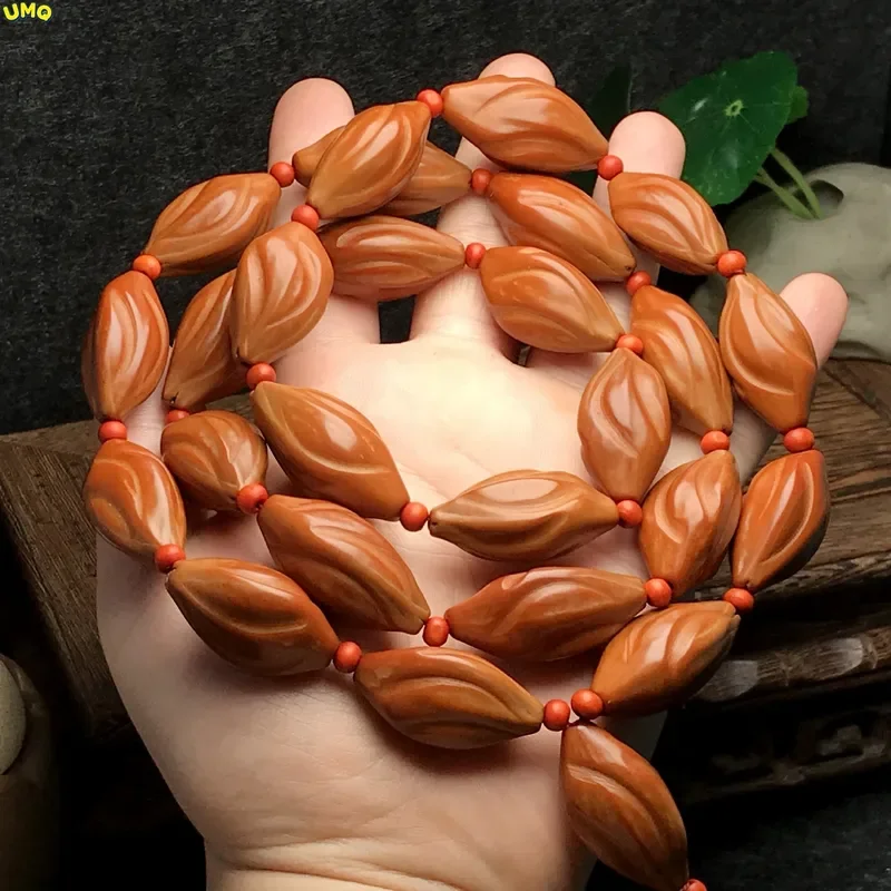 

Wholesale Natural Olive Shell Bracelets Carving Twisting Beads Hand String Red Oil Old Nuclear Wenwan Wood Bracelets Jewelry