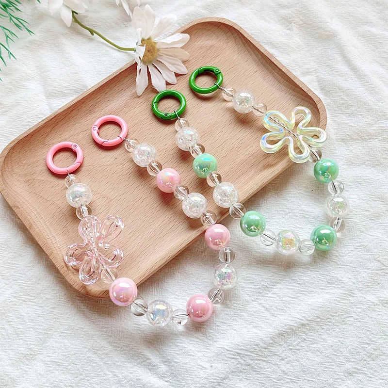 Cadena de teléfono móvil con cuentas de flores acrílicas, cordón antipérdida para teléfono, llavero con colgante de taza de agua, bolso, cadena para auriculares y cámara