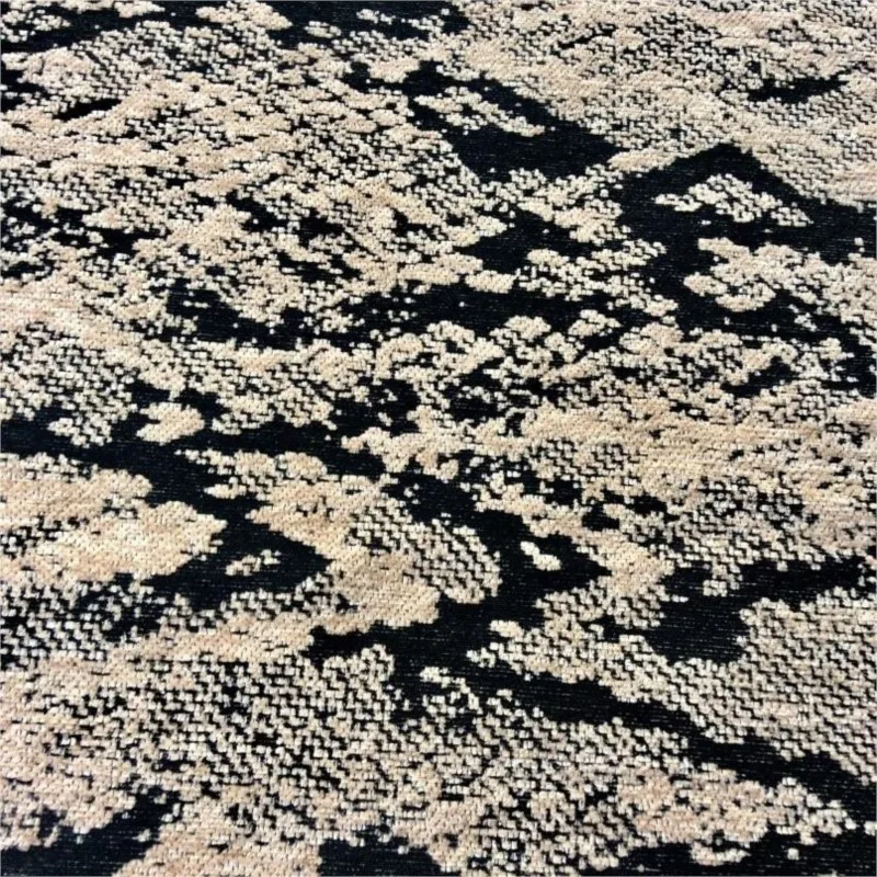 New leather-textured jacquard fabric for suits trousers skirts and bags