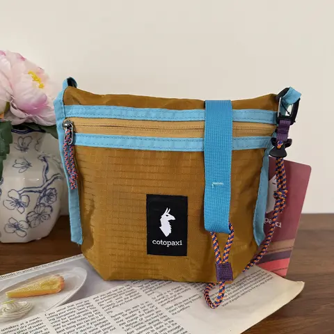 COTOPAXI GEAR FOR GOOD Sac bandoulière multicolore, sac à bandoulière décontracté pour shopping et loisirs