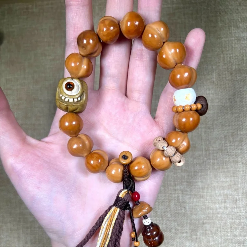 Houhou walnut smooth heart-shaped peach, deer antler, Katsura, one-eyed accessory, single-ring hand-held tassel Buddhist