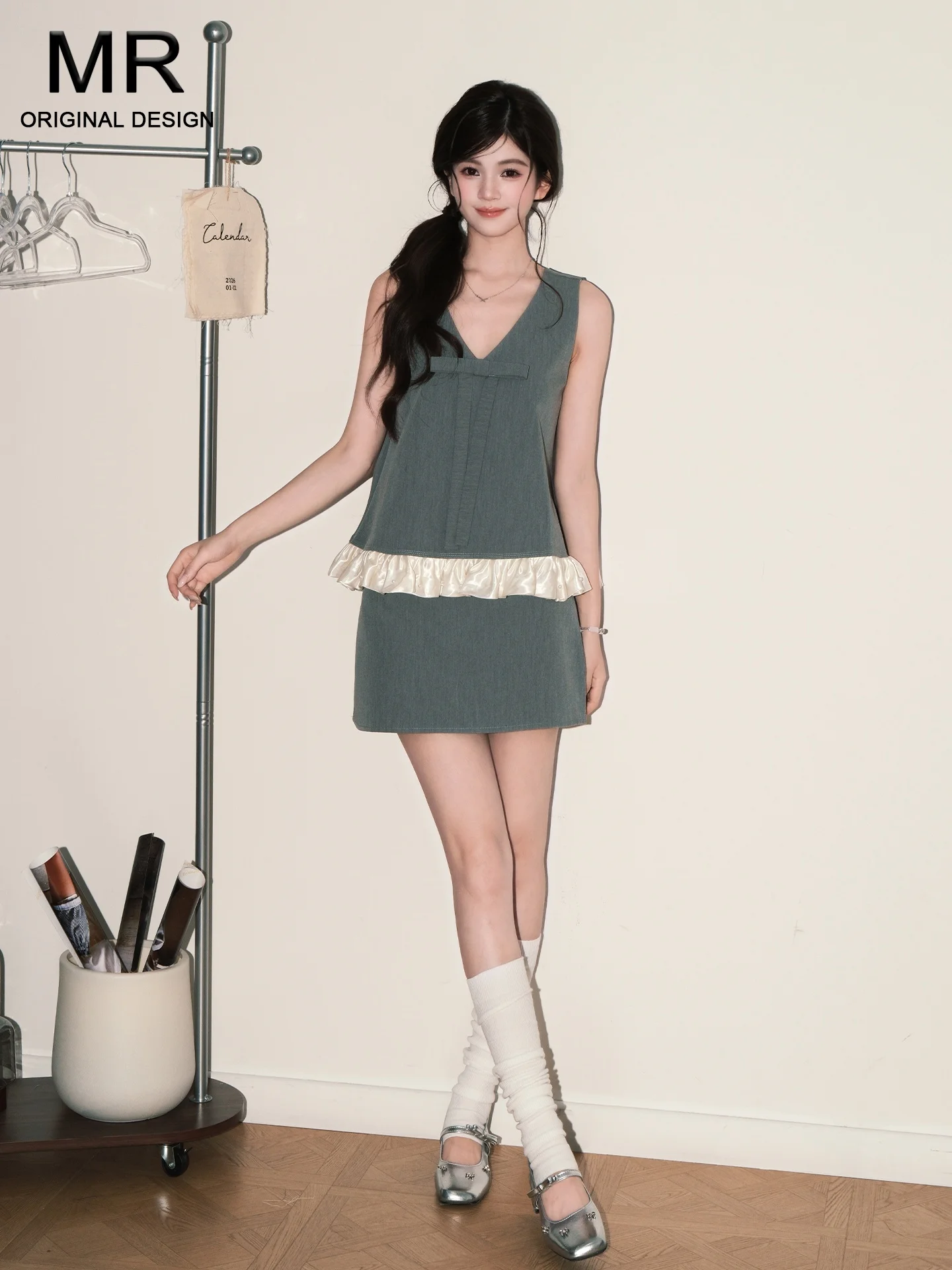 Conjunto de chaleco suelto con nudo gris para mujer, novedad de verano 2026, falda de cintura alta dulce, traje de dos piezas, estilo casual, sin marca