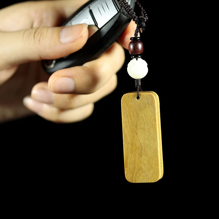 سلسلة اليد محفورة خشب الصندل حادث سيارة المفاتيح قلادة الخوخ الخشب مكافحة فقدان علامة الخصر السلامة