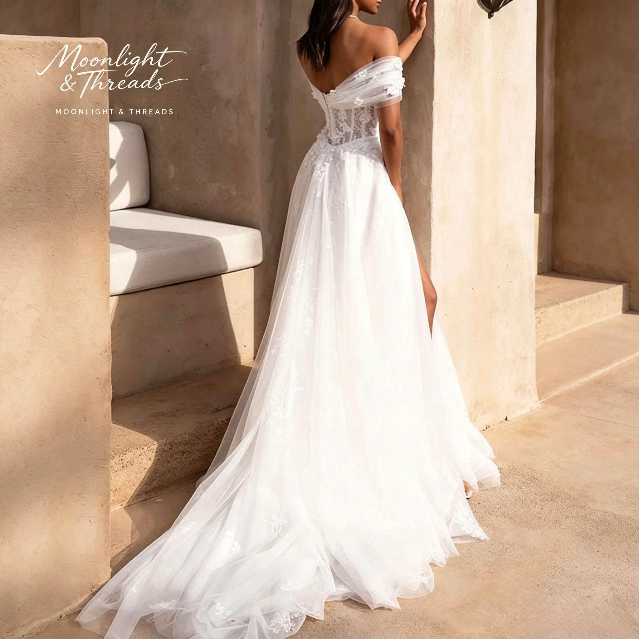 White off-shoulder strapless sleeveless A-line dress floor-length formal occasion wedding dress with boning and appliqué details view 3