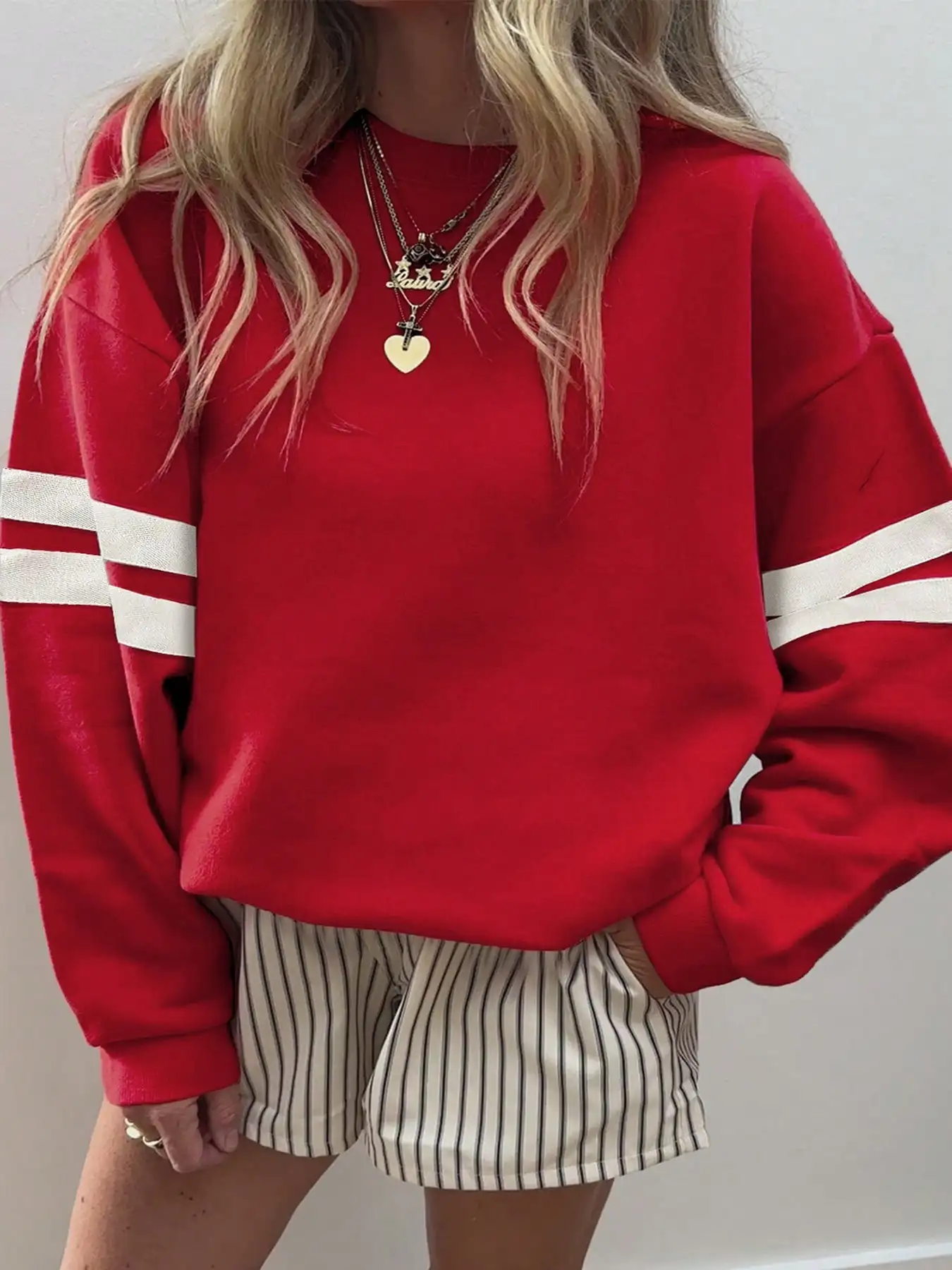 

Women's Red Oversized Pullover Sweatshirt with White Stripe Sleeves