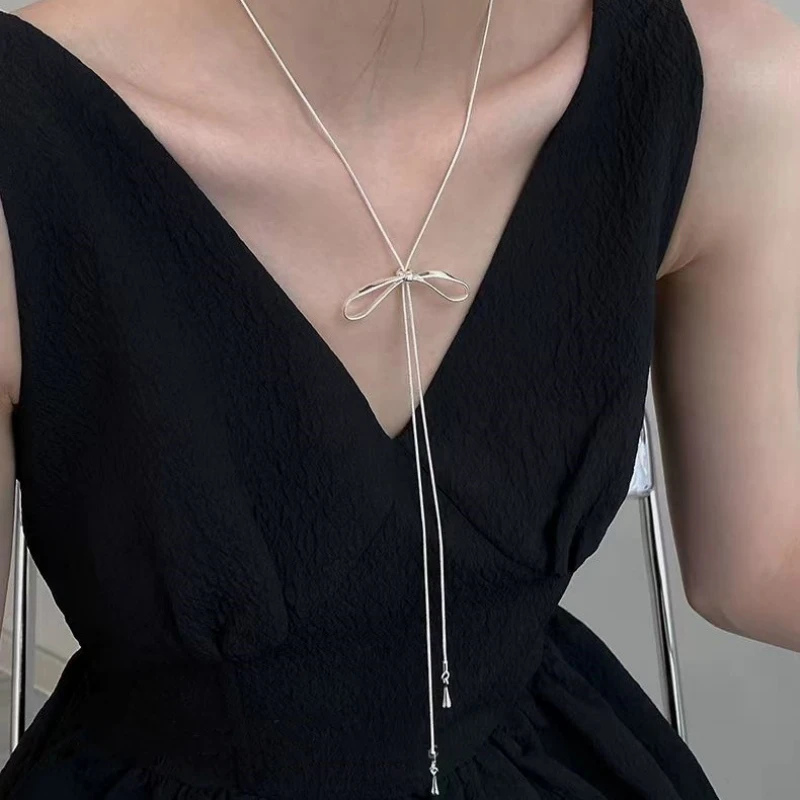 New Silver Color Long Rope Women's Necklaces Hollow Movable Bowknot Bohemian Fashion Neck Jewelry Winter Sweater Chain 2026