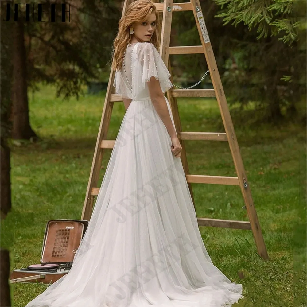 JEHETH maniche corte a pipistrello a-line abiti da sposa 2024 o-collo Backless abiti da sposa bottoni posteriori perline Tulle vestido de noviaJEHETH maniche corte a pipistrello a-line abiti da sposa 2024 o-collo Backl