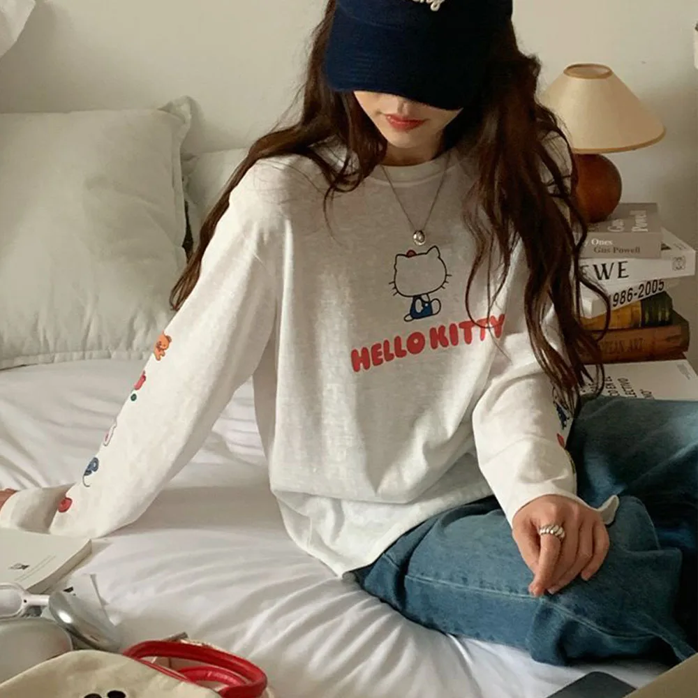 Camiseta de manga larga con estampado de Hello Kitty para mujer, camisetas informales holgadas con cuello redondo, camiseta bonita de estilo coreano con dibujos animados para chicas adolescentes