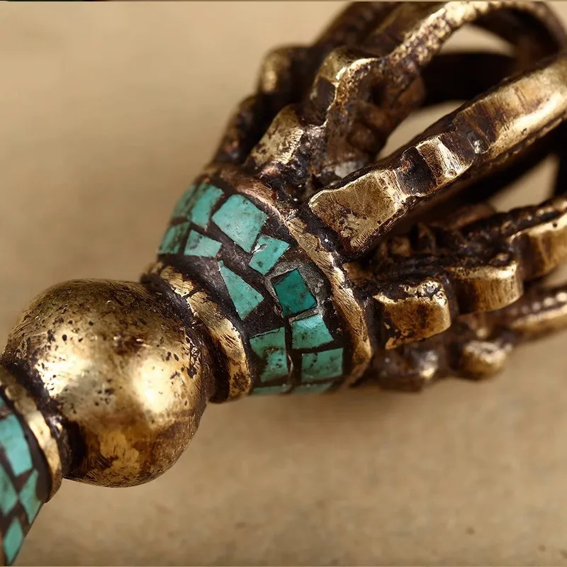 Antique-style, pure copper Vajra with turquoise inlay, featuring nine strands