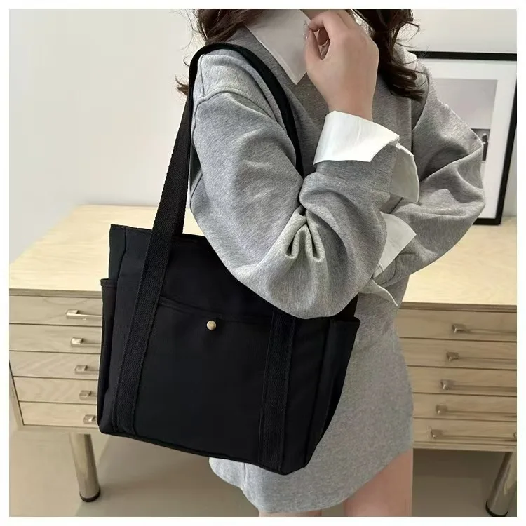 Große Canvas-Tragetasche für Arbeit und Ausgehen, Hochwertige Vielseitige Tasche für Pendler, Literarische und Künstlerische Studentenmode – Detail 5