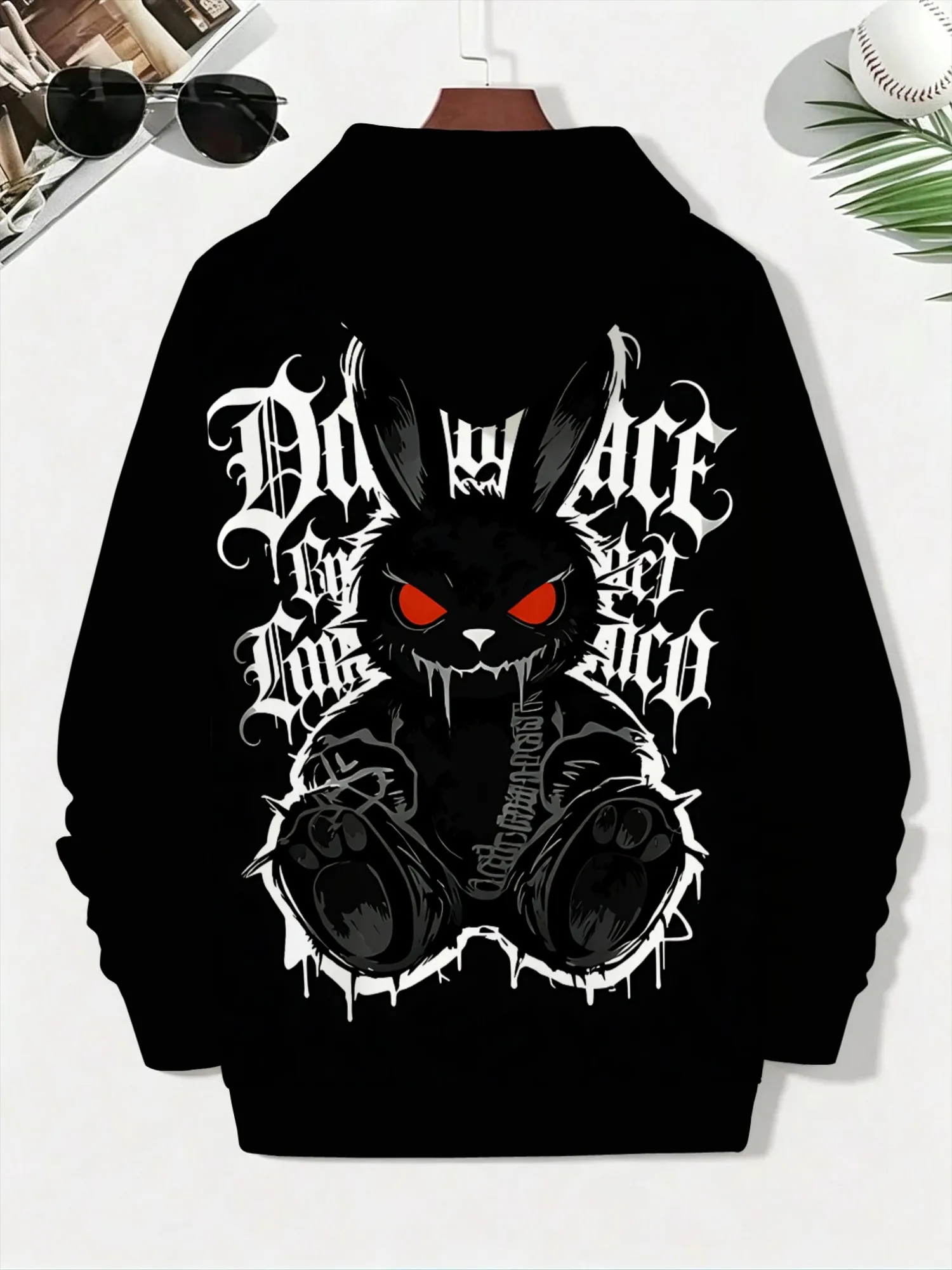 Men’s hooded sweatshirt featuring a gothic-style black rabbit motif; suitable for workouts or everyday wear.