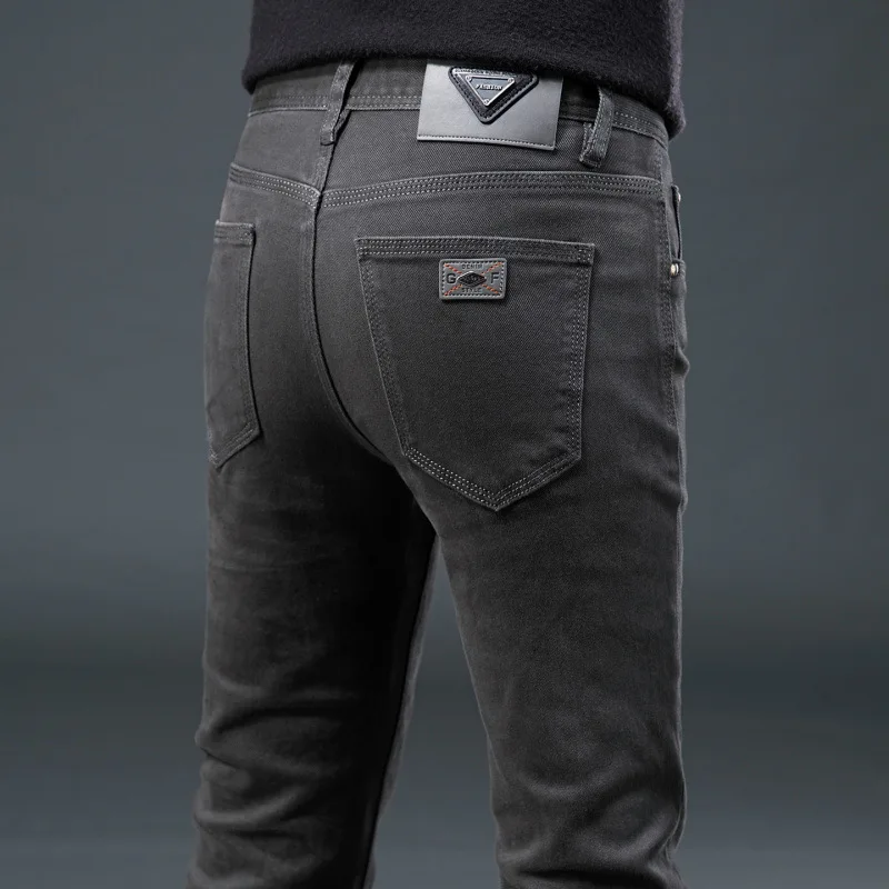 

Легкие роскошные эластичные мужские джинсы 2025 года, модные осенние брюки на небольшую ногу, универсальные повседневные деловые брюки