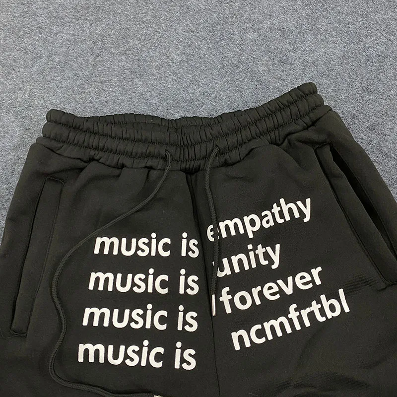 Spodnie American Vintage z lat 2000. Kreatywne, personalizowane litery, nadrukowane spodnie, hip-hopowe, streetwearowe, sportowe, luźne, elastyczne spodnie do joggingu.