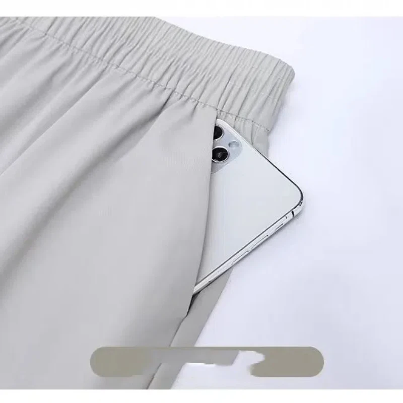Summer Ice Silk 2024 Women's New Splicing Elasticized High-waisted Pocket Printed Fashion Loose Minimalist Casual Straight Pants