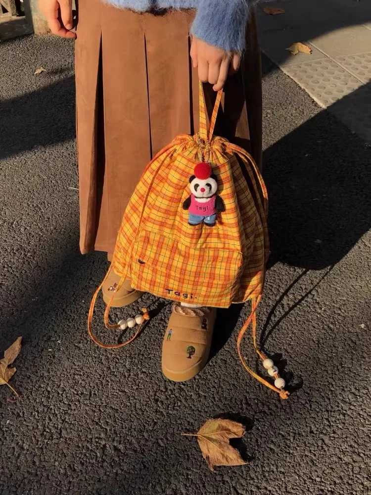 

Xiaohongshu Recommended Summer New Pearl Acrylic Drawstring Yellow Plaid Backpack for Women Large Capacity Backpack，Tagi.Beaded