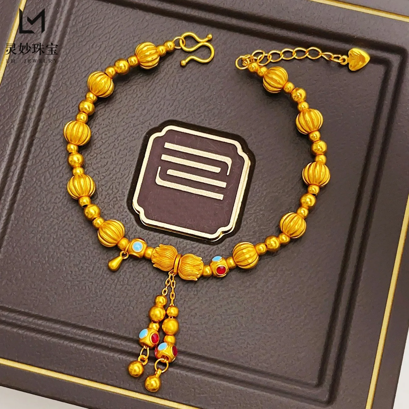 

Sturdy & Durable Cloisonne Twin Lotus Pumpkin Bead Tassel Bracelet For Women 24K Gold AU999 | Solid craft, not easy to deform