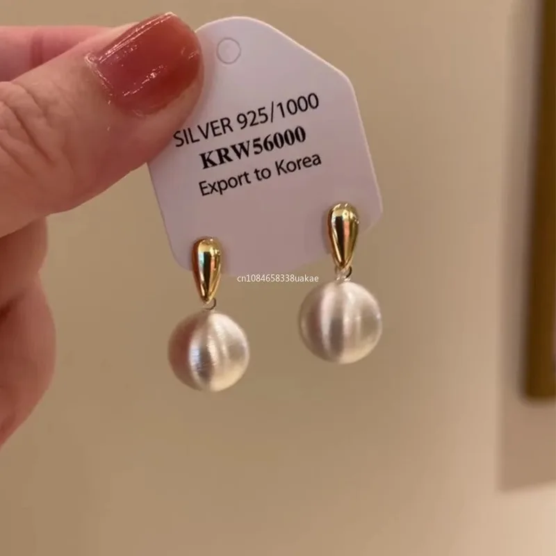 Pendientes colgantes de perlas de imitación de pera en forma de lágrima elegantes a la moda, joyería Simple y versátil, regalos para mujeres, aretes coreanos de mujer