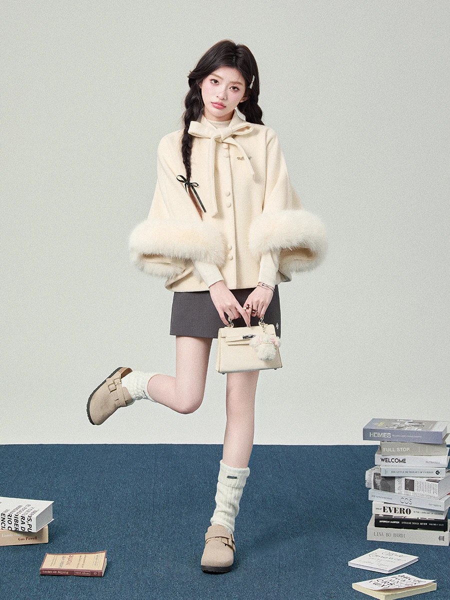 2025 Otoño Invierno nuevo estilo universitario de gama alta de las mujeres peludas blanco Floral gris negro suelto con cordones capa abrigo