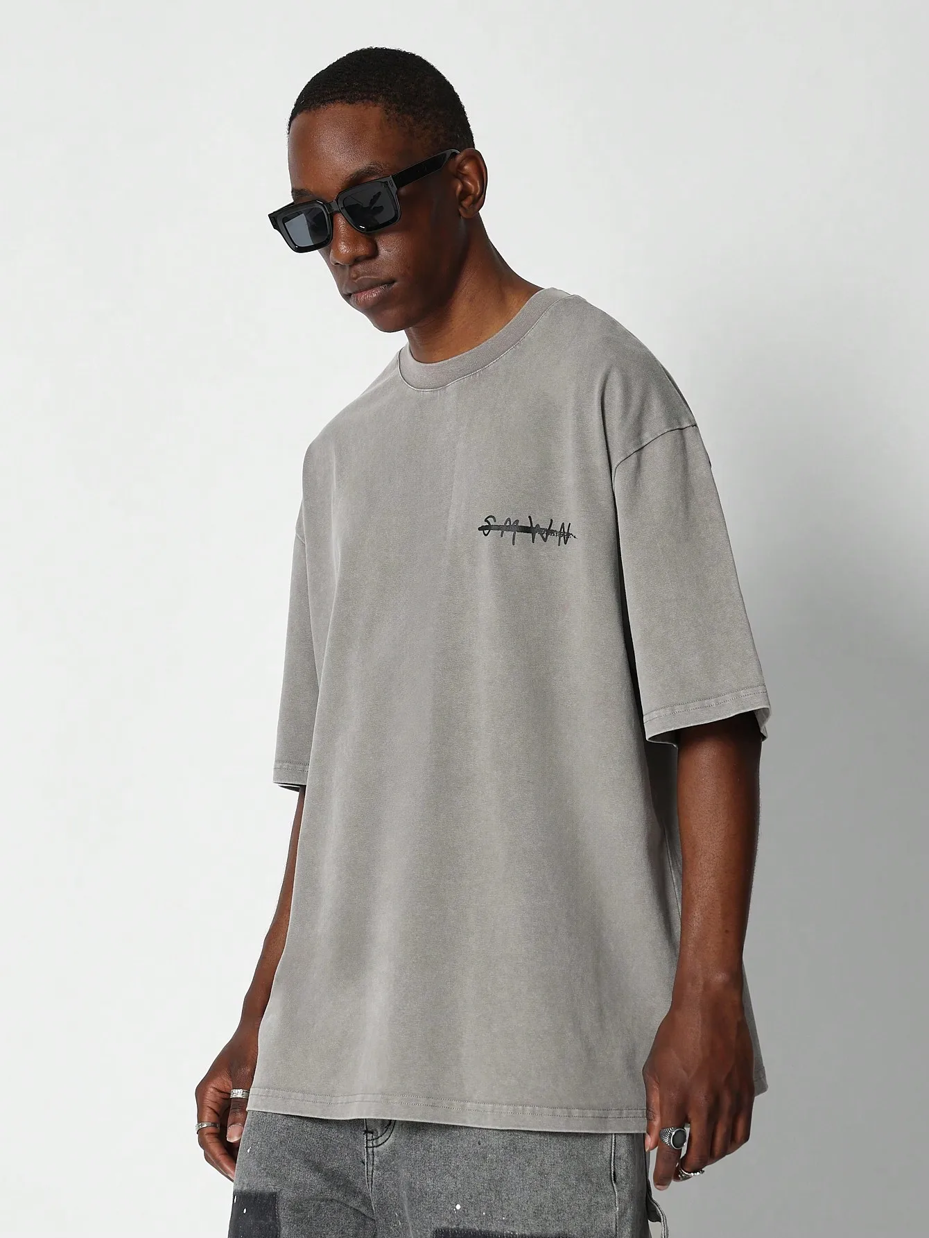 

SUMWON oversized short-sleeve T-shirt with text and pattern prints