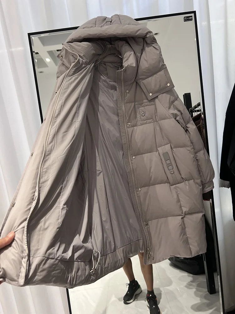 Piumino invernale nuovo da donna medio a lungo edizione coreana felpa con cappuccio alla moda addensata allentata versatile piumino d'anatra bianco