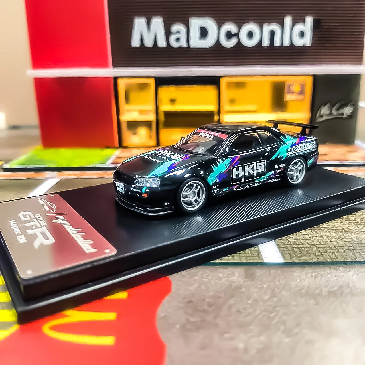 

Модель автомобиля MC 1:64 SKYLINE R34 Turbo V-SPEC HKS Литая под давлением модель автомобиля
