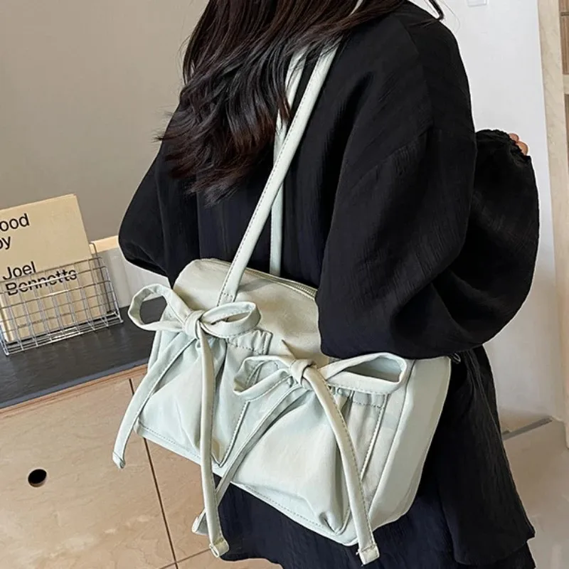 2024 New Bow Nylon Shoulder Bags Women Fashion Korean Large Capacity Lightweight Commuter Handbags Simple Casual Solid Tote Bags