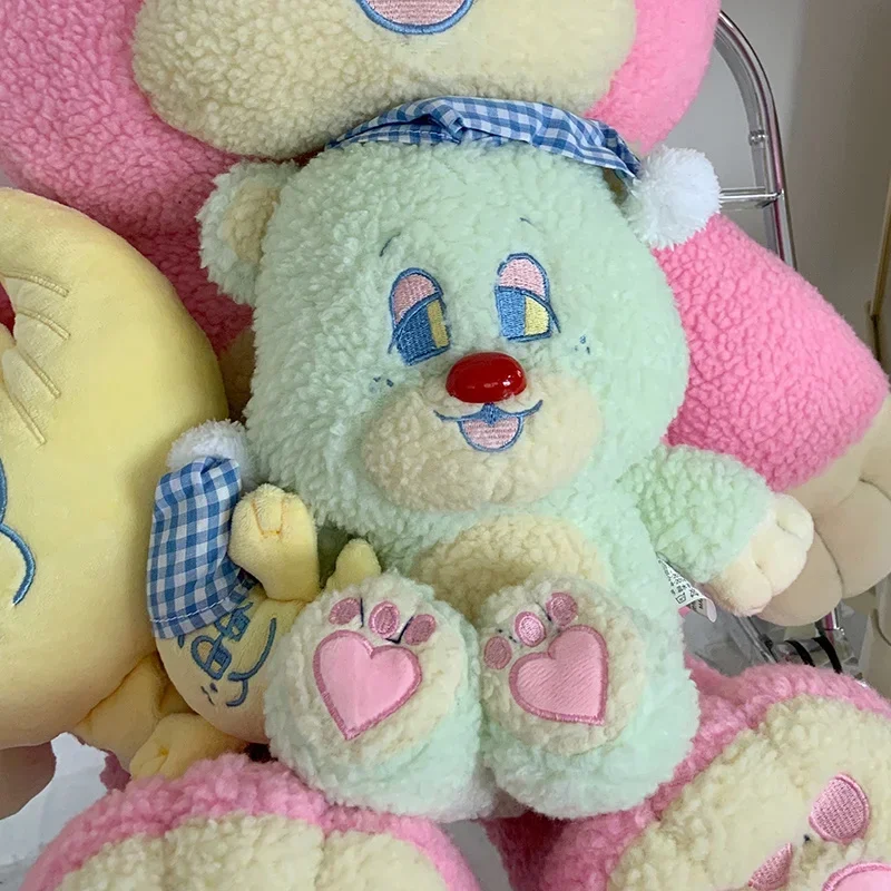 韓国で人気のピンクのクマのぬいぐるみ、アニメの緑の寝間着の帽子をかぶった月の眠っている人形、女の子向けの高品質な紫色のテディベア