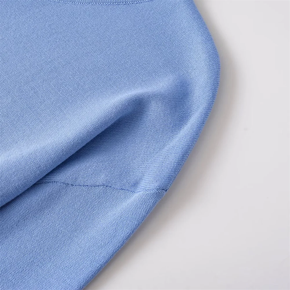 Camicia lavorata a maglia con ago piatto e girocollo allentato con bottoni alla moda delle nuove donne autunnali