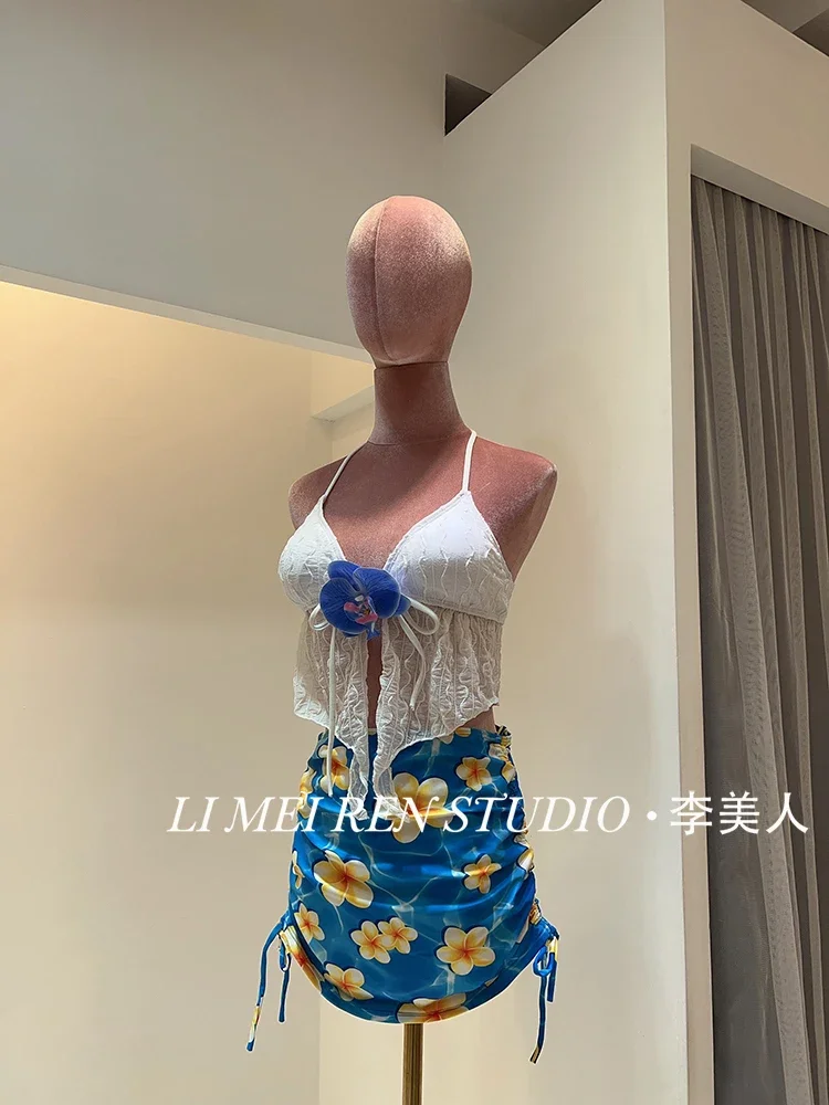 New white floral camisole vest, hip hugging short skirt, split swimsuit, bikini three piece set