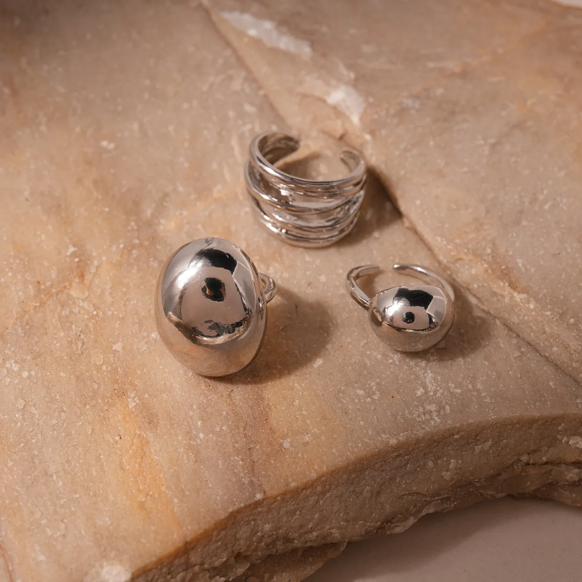 Exaggerated oval three-piece open ring, light luxury index finger ring, fashionable and simple jewelry.