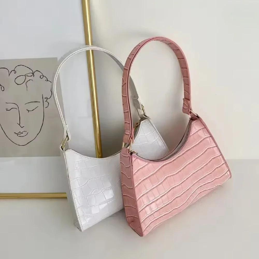 2025 bolsos exquisitos y elegantes para mujer, bolsos de hombro de viaje elegantes para mujer, bolso de cadena de Color sólido de cuero genuino para mujer