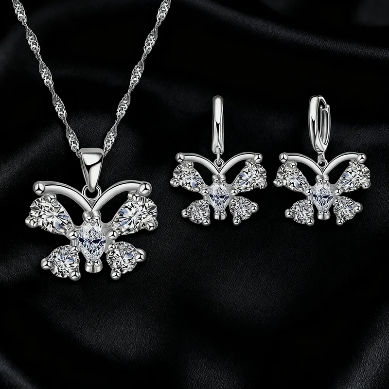 طقم مجوهرات على شكل فراشة كريستال نمساوي لامع وقلادة وأقراط للنساء من الفضة الإسترليني عيار 925 عالي الجودة