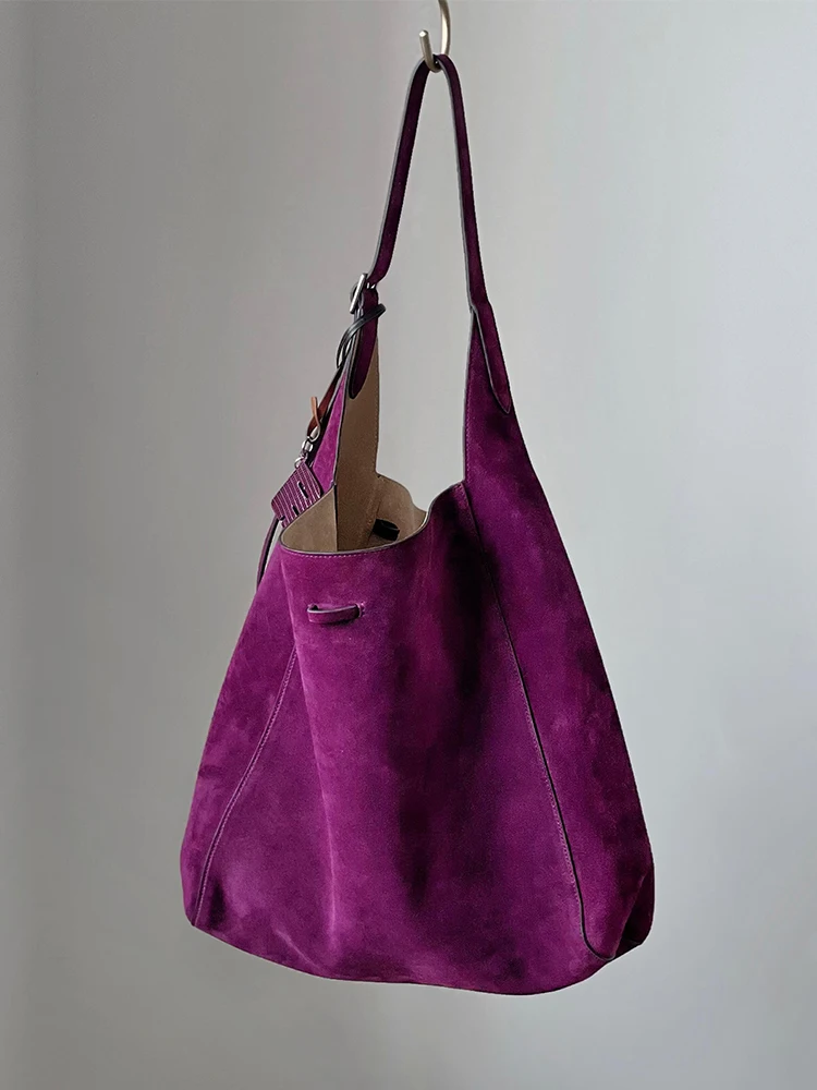 

New Fashionable Matte Suede Head Layer Cowhide Bucket Shoulder Bag 2025 New Light Luxury Niche Premium Commuting Women Bag Trend
