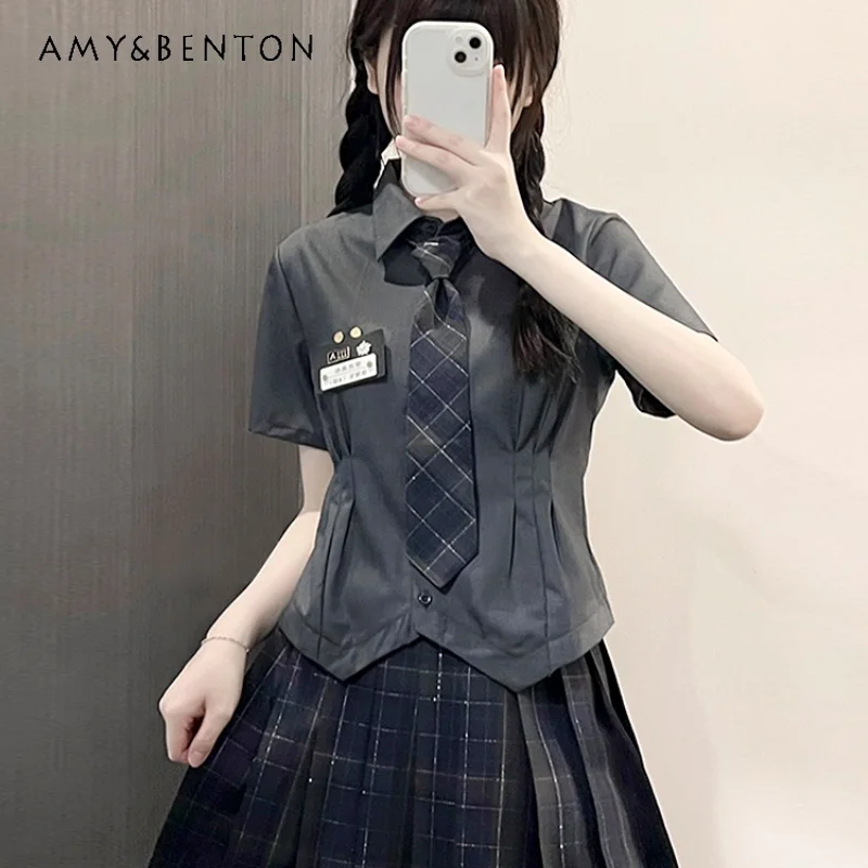 Uniforme japonés JK de estilo pijo para mujer, traje ajustado de Color blanco y gris, camisa de manga corta, Top y Falda plisada, novedad de 2024