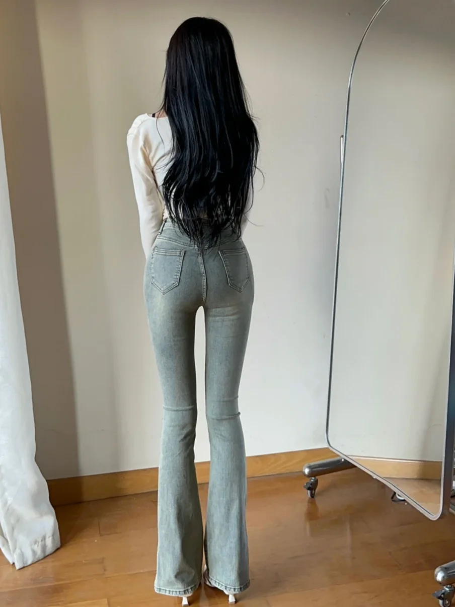 

Эластичные расклешенные джинсы с высокой талией, корейские утягивающие джинсовые брюки с разрезом, женские весенне-осенние хлопковые брюки...