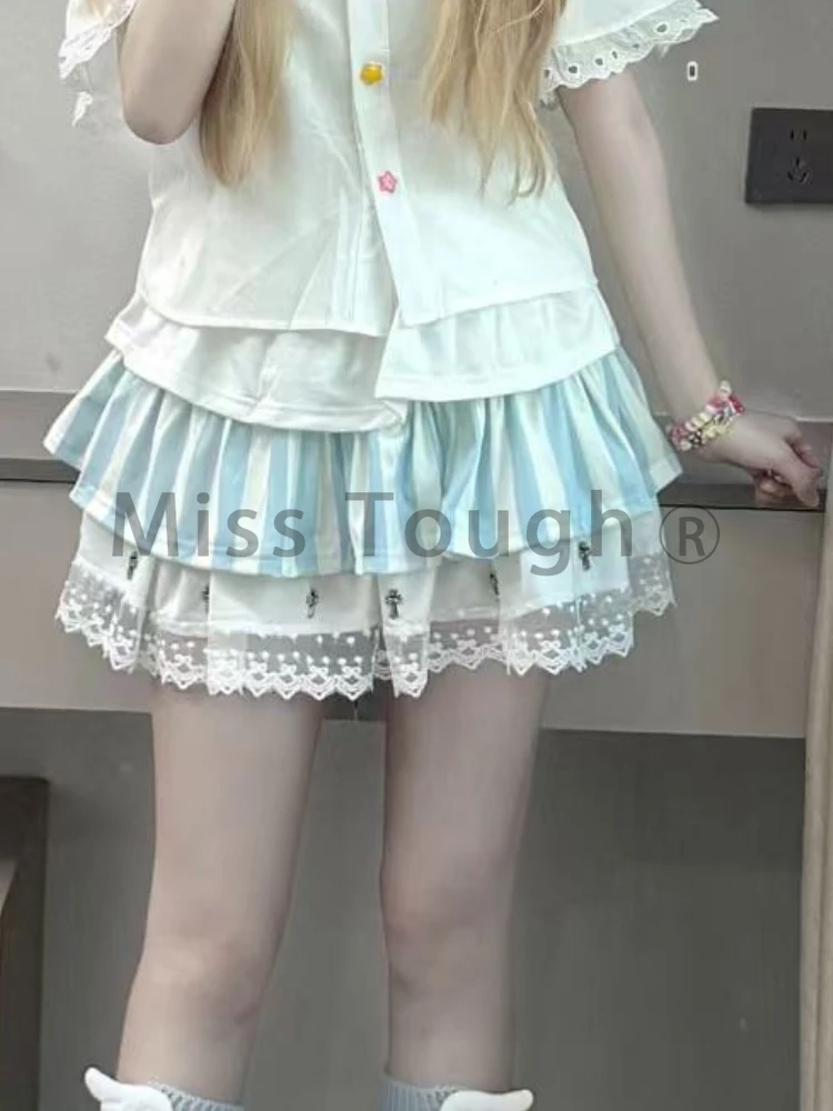 اليابانية المرقعة الحلو تنورة المرأة Kawaii Harajuku كعكة رقيق التنانير أزياء من الدانتل الأزرق مخطط ضئيلة تنورة صغيرة الإناث جديد